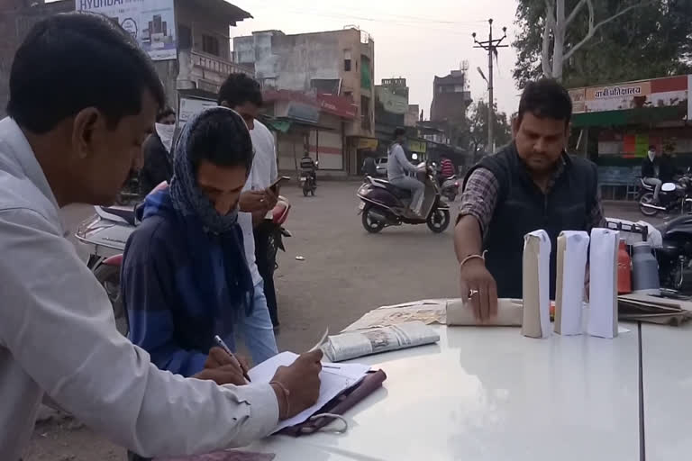 Officers taking samples of milk