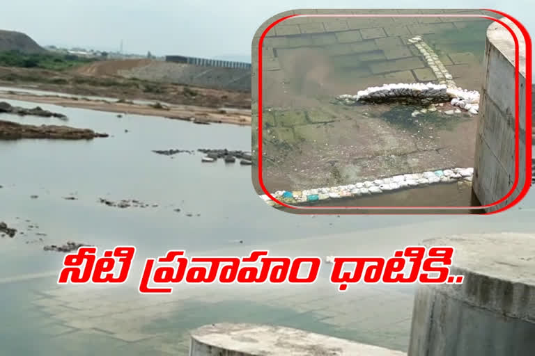 raft-blocks-are-flushed-in-water-at-sundilla-barrage-in-peddapalli-district