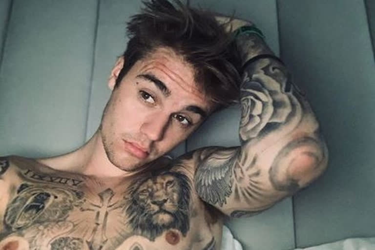 Inked! Justin Bieber flaunts new tattoo on his neck