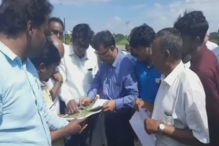 Highway Department officials inspecting the flag pole at Kanyakumari