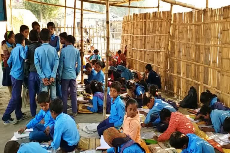 Children studying on the ground in Betia's government school