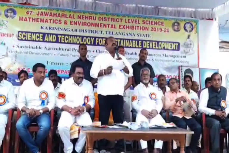 Minister Ganguala addressing the science fair at karimnagar