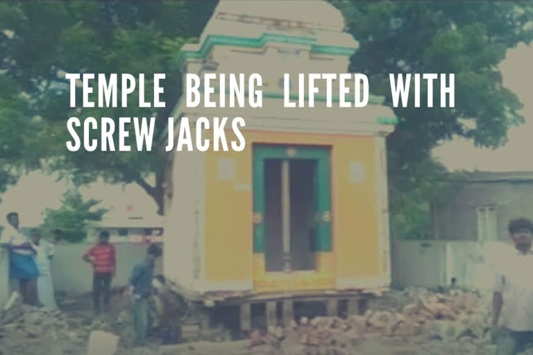 AP temple damaged in flood being lifted with screw jacks