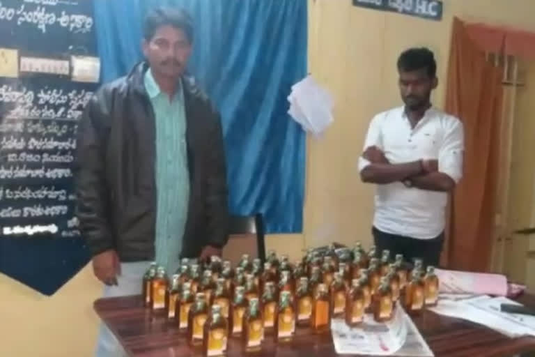 volunteer caught by liquor battles at devarapalli vizag district