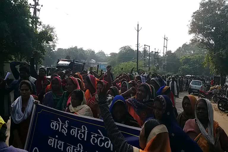 Thousands of tribal families took to the streets to protest dam construction