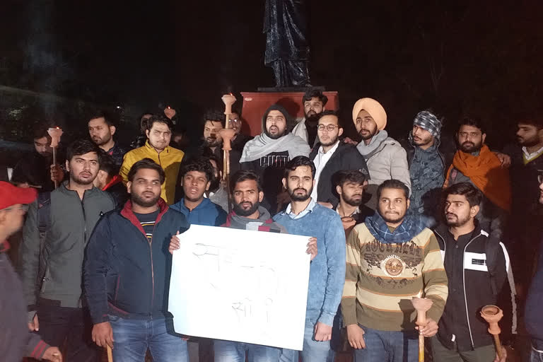 NSUI holds torch procession over vandalism with students in delhi university