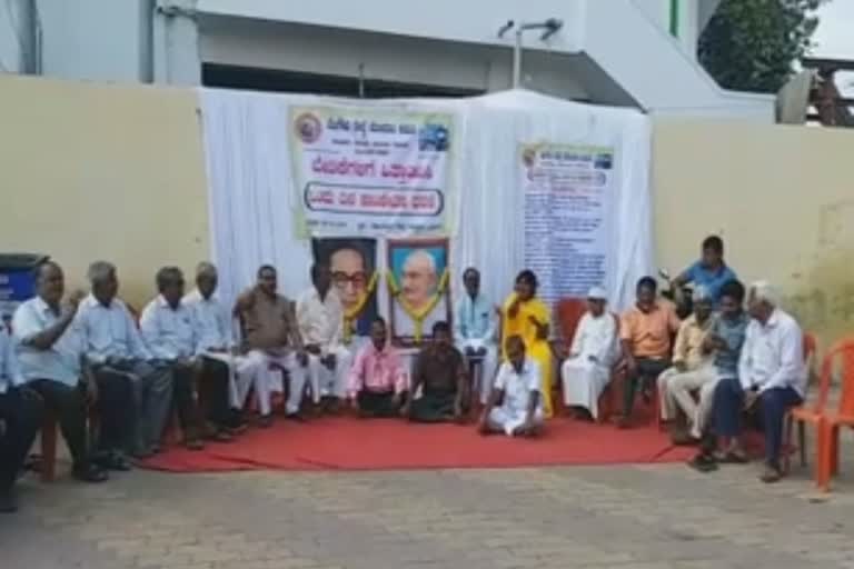 Symbolic staging at Vijayapur railway station with various demands