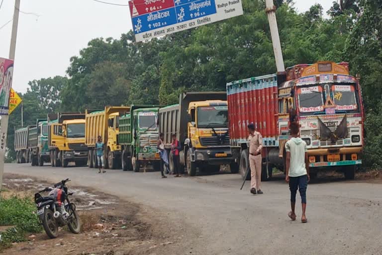 police action against overload sand dumpers