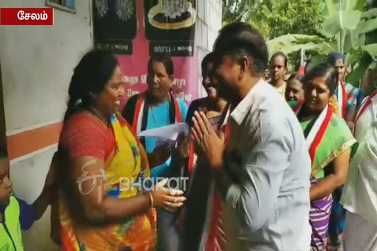 salem admk candidates touched people feet for vote