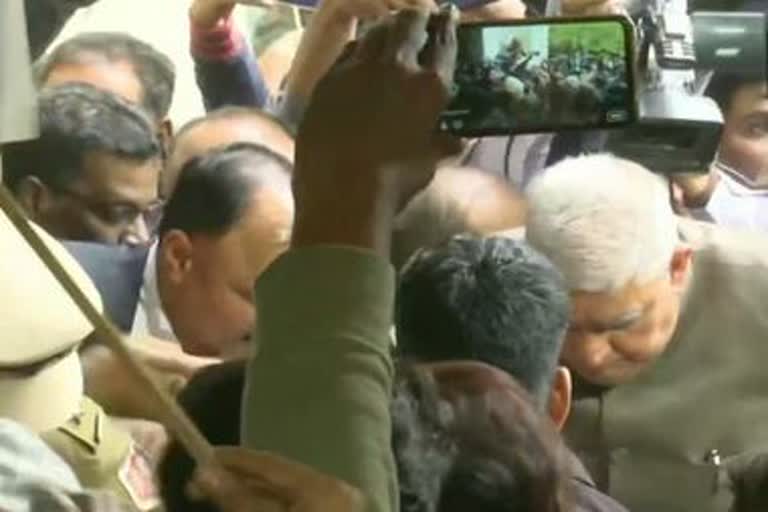 university students shown-black-flag to governor