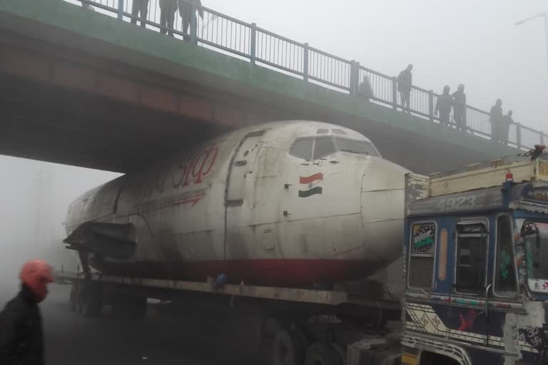 A truck carrying cargo aircraft got stuck in overbridge in Durgapur