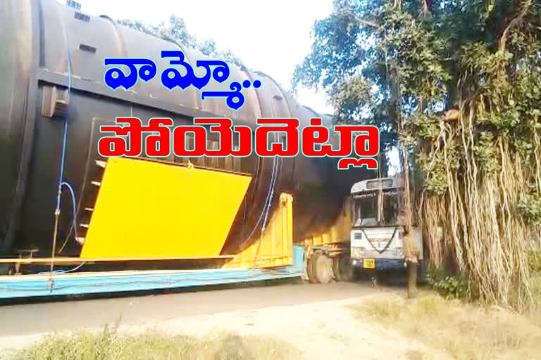 Heavy machine on truck Traffic jam on the road at siddipet