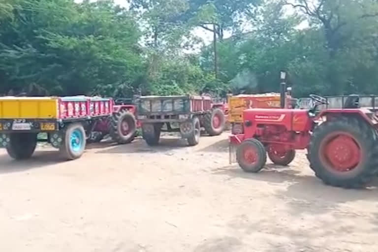 police take over sand tractors at kanchikacherla in krishna district