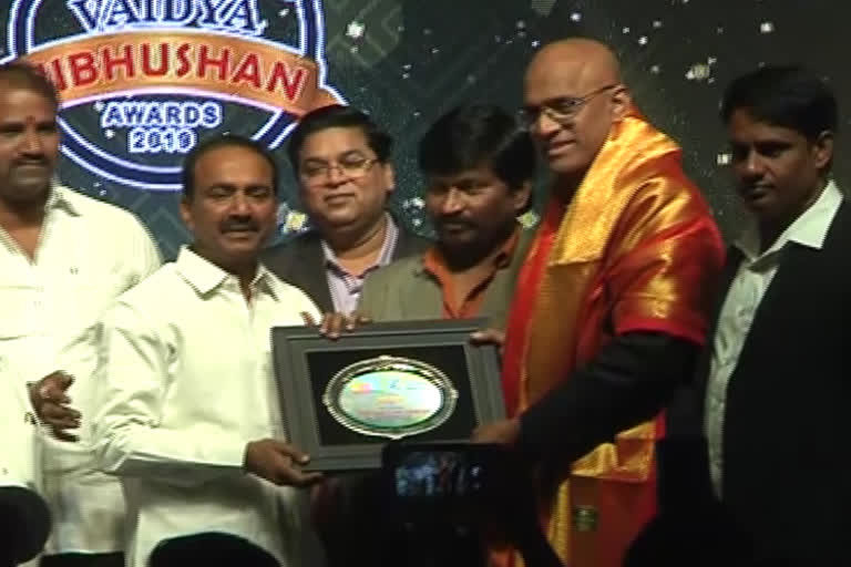 minster eetela rajendar attended to award function in hyderabad