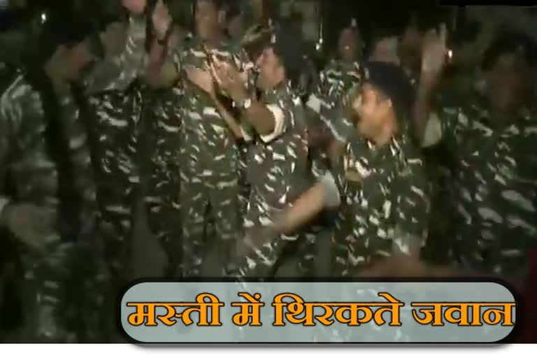 security forces are celebrating new year by dancing and singing.