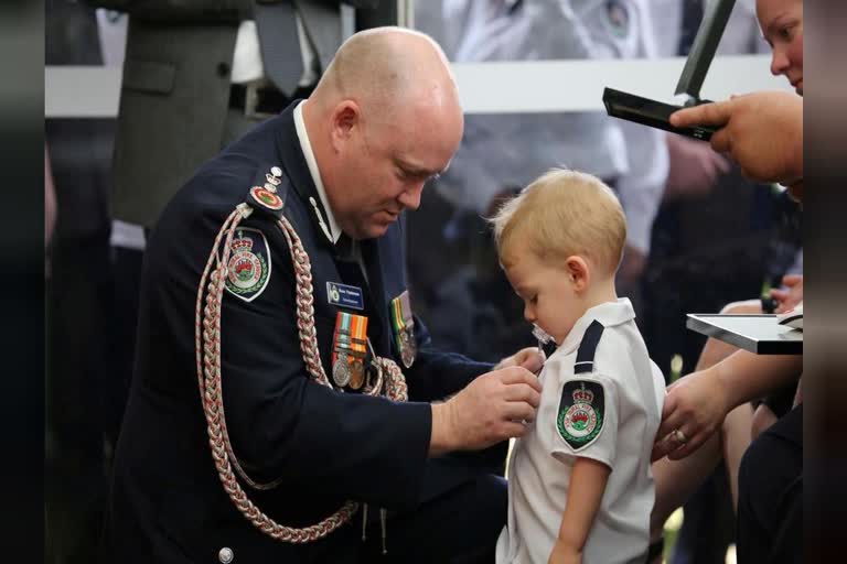 Toddler son receives posthumous medal for killed Australian firefighter