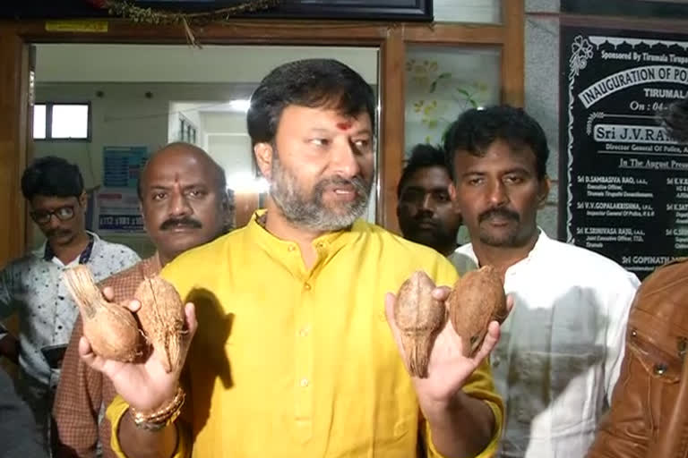 Bjp leader bhanu prakash reddy police complaint on coconuts in tirumala