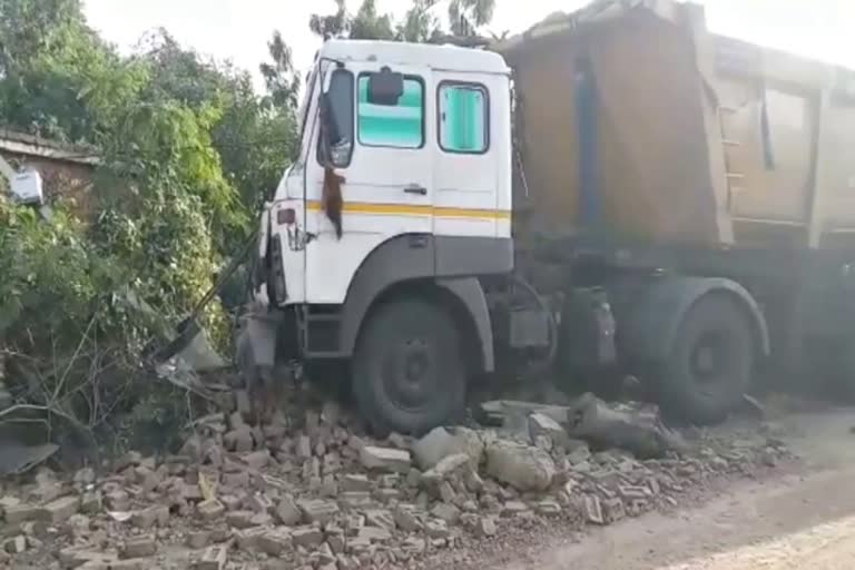 Uncontrolled truck enters house