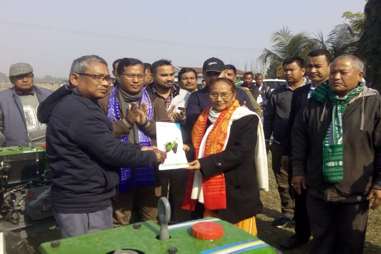 minister pramila rani brahma distribute power tiller among the farmers