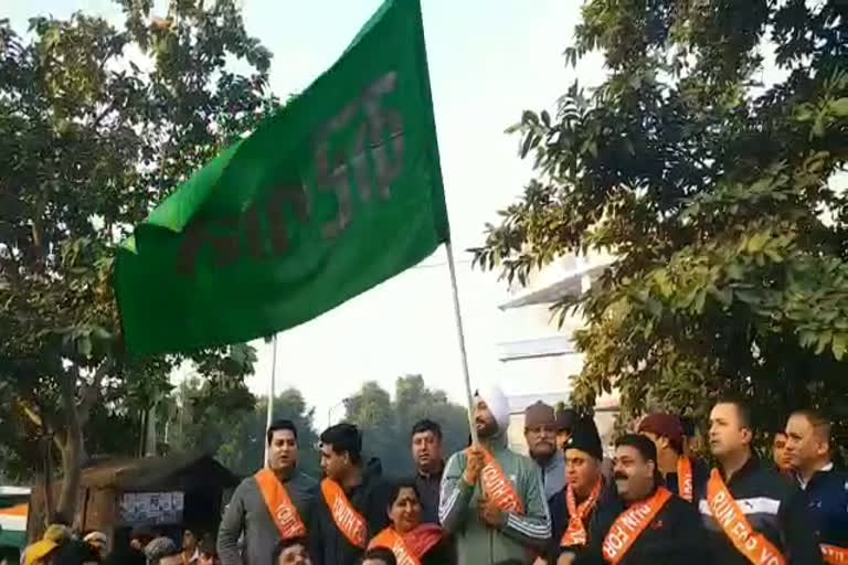 Minister of State Sandeep Singh flagged off the marathon race