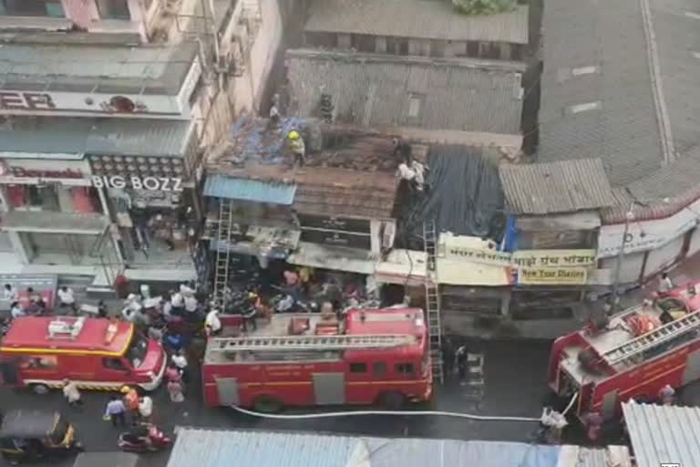 fire on electric shop in thane