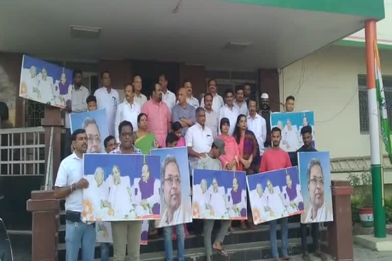 Congress Activists protest against Siddaramaiah