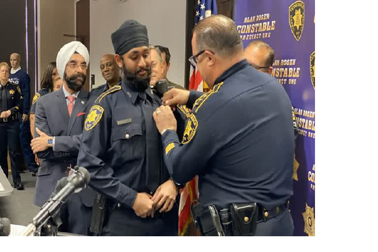 A turbaned young man becomes a police officer in the United States