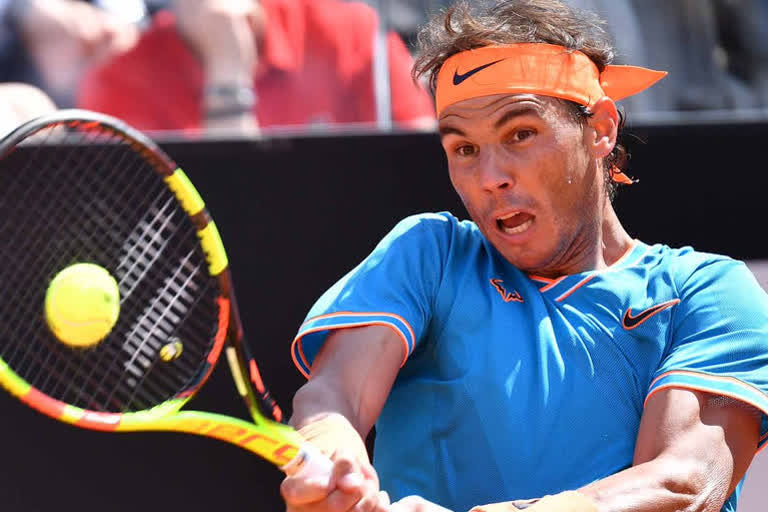 Nadal shows caring side with kiss for blushing ballgirl