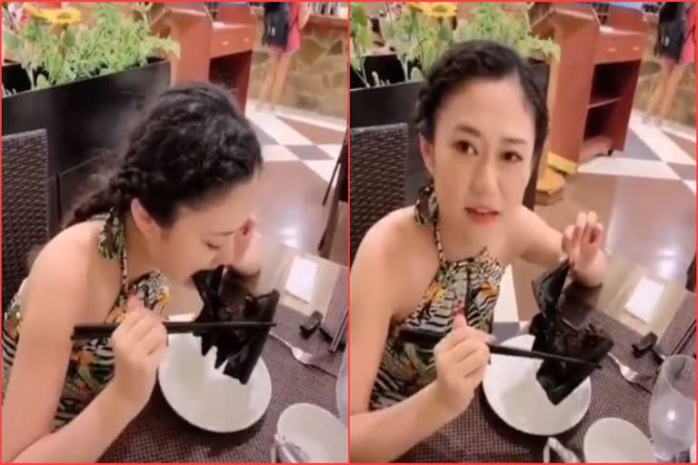 ಬಾವಲಿ ತಿನ್ನುವ ಭಯಾನಕ ವಿಡಿಯೋ ವೈರಲ್, Horrifying video has emerged of a woman eating a bat