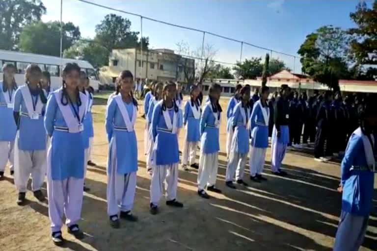 School students and police personnel rehearsal