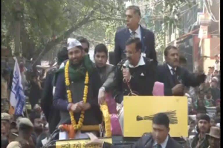 CM Arvind Kejriwal holds roadshow in Karol Bagh