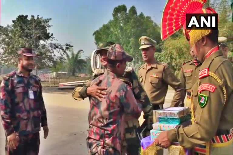 Republic celebration at Fulbari ,  BSF warriors sharing sweet at the border!