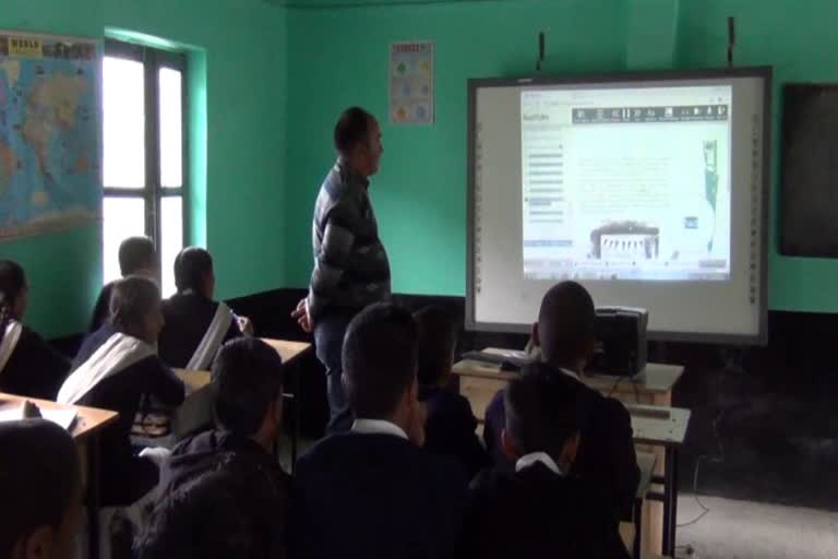 Children studying in smart class in Parihar govt school