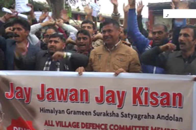 village defense committee members protest against government, demand release of pending dues