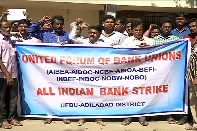 bank employees protest for demons in adilabad