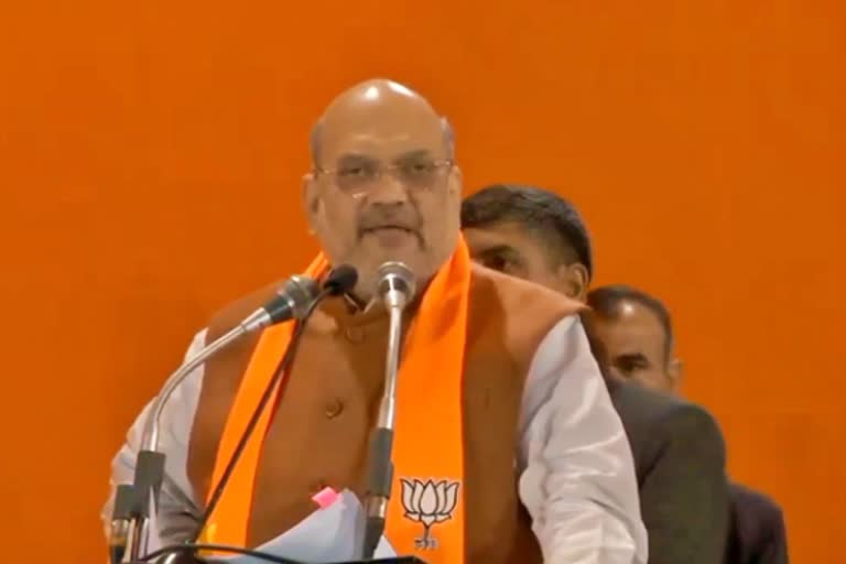 home minister amit shah addresses a public meeting in Delhi