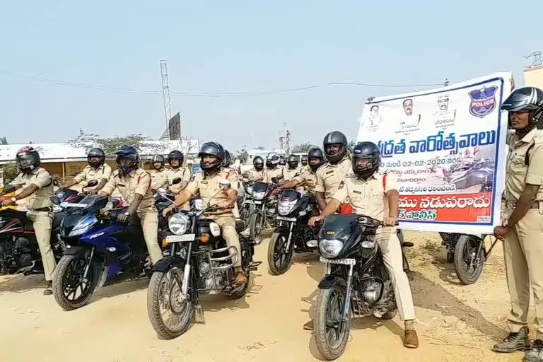 Two-wheeler rally for police men to wear helmet at nagar kurnool district