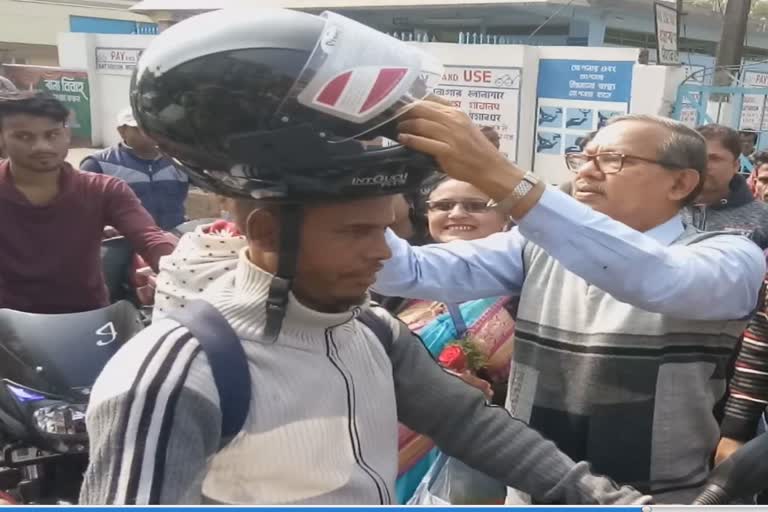 Silchar M.L.A Dilip kumar pal distribute helmet at Silchar