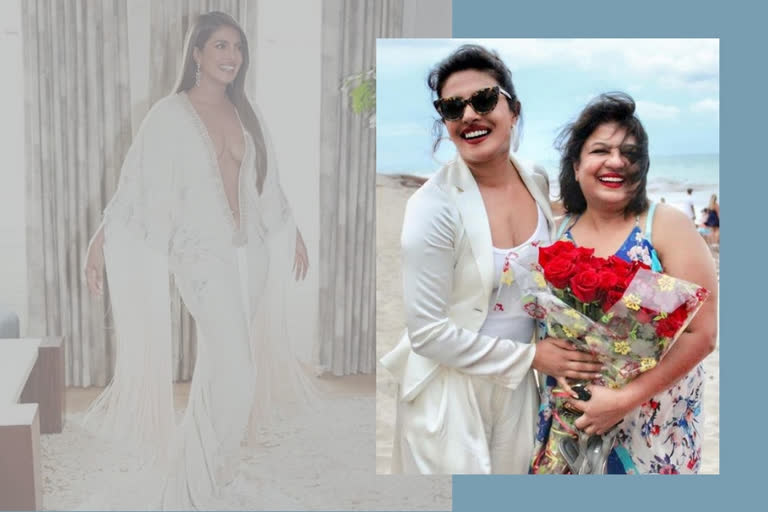 Madhu Chopra stands beside Priyanka Chopra