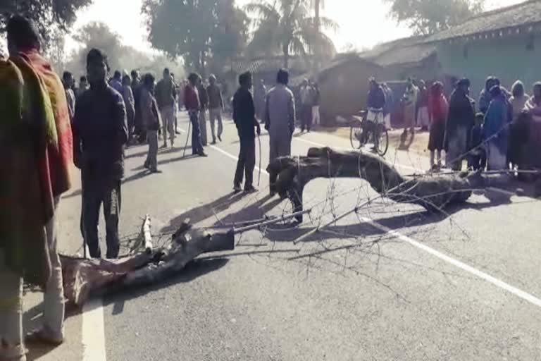 Villagers close the road