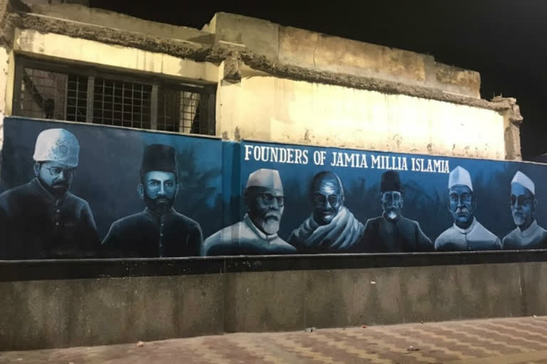 Photos of Jamia's founders near the metro gate