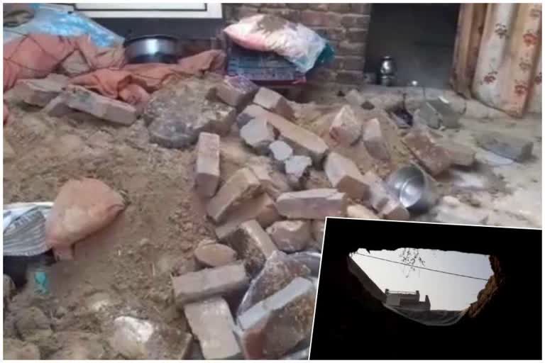 roof collapses the woman asleep in the house