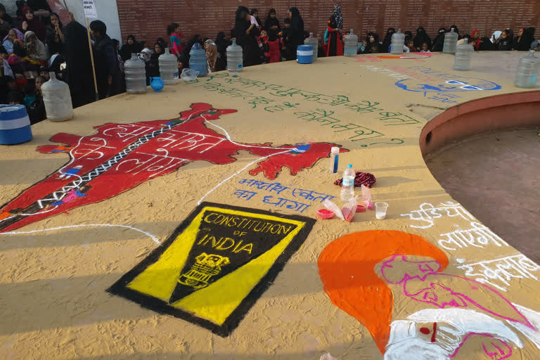 Artists create maps of India and various exhibits at an anti-CAA demonstration by artists at the Jaipur martyr monument