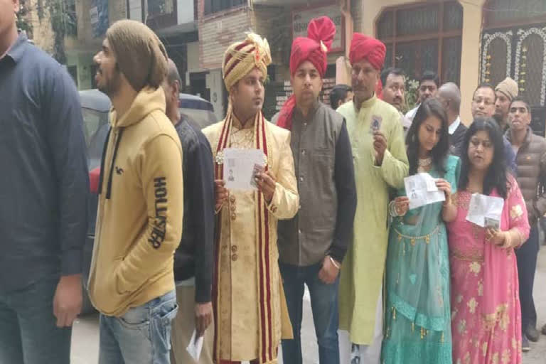 groom cast his vote before going for marriage in shakarpur in delhi