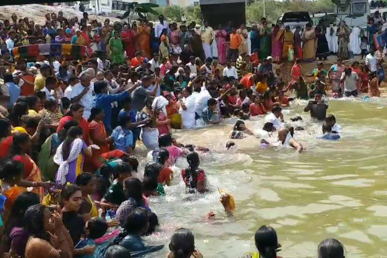 Trisula snanam in the Srikalahasti Swarnamukhi River