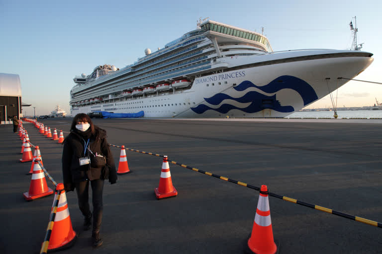 The quarantined cruise ship Diamond Princess anchors at the Yokohama Port,