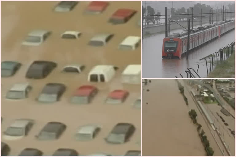 Heavy rains in Sao Paulo brought Brazil's most populous city nearly to a halt on Monday with floods, mudslides and enormous traffic jams.