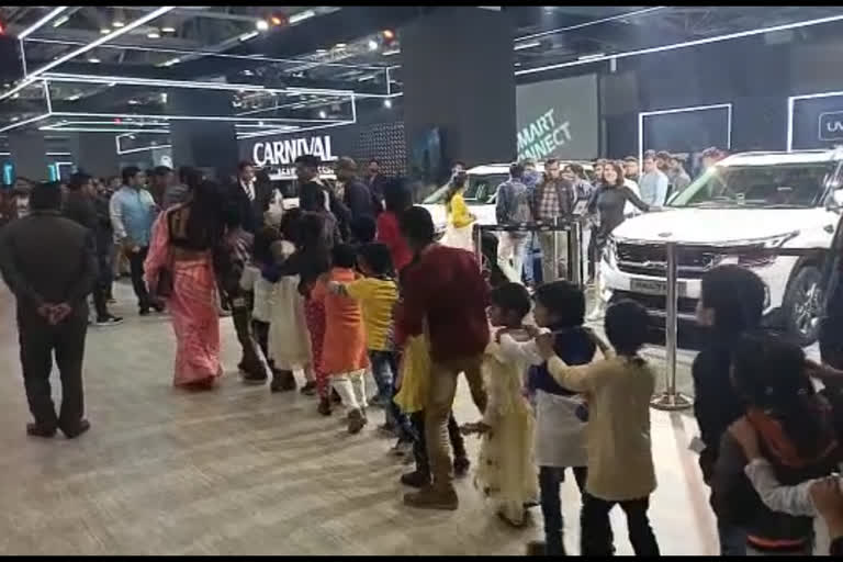 Slum children saw vehicles at Auto Expo in Greater Noida