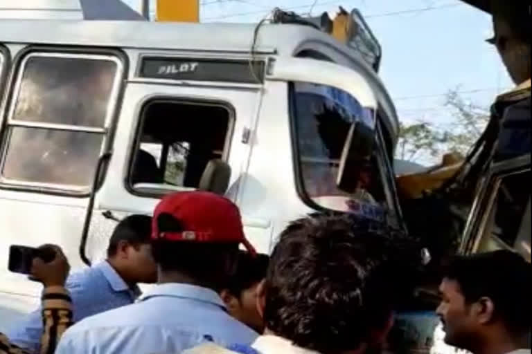 Collision between college bus and passenger bus