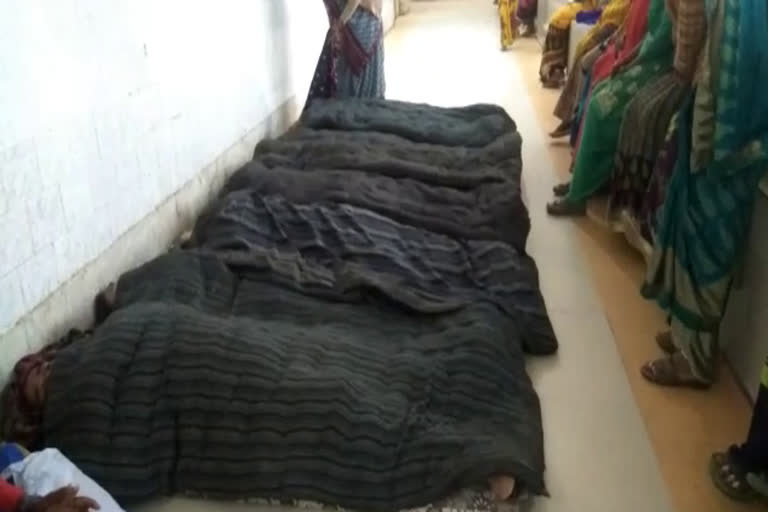 After sterilization, women lie on the ground